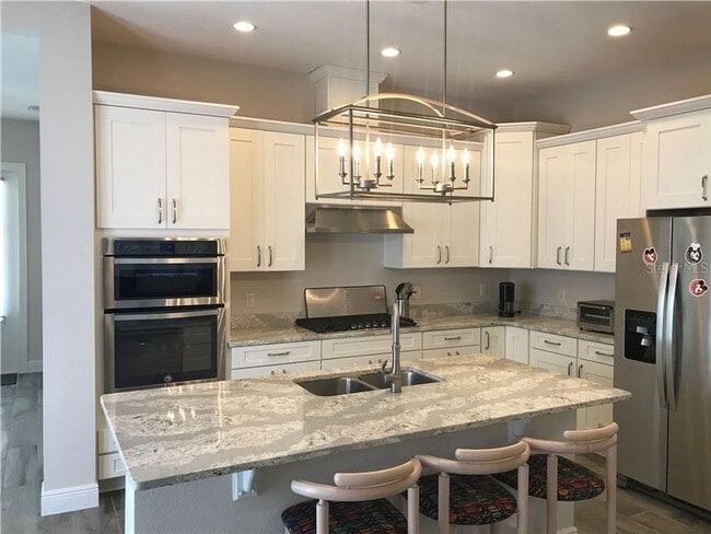 Building Photo - 8896 Bismarck Palm Dr