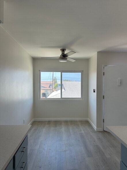 Dining area looking west from kitchen - 21104 Donora Ave