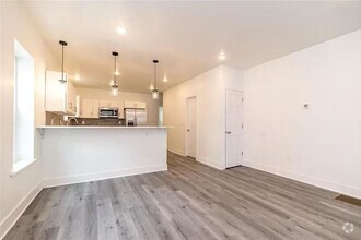 Building Photo - Brand New 4 Bedroom / 3.5 Bathroom Townhom...