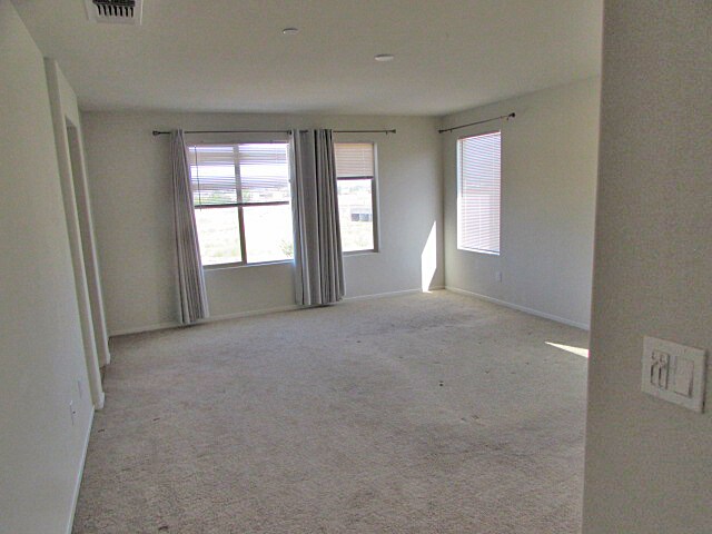 Building Photo - Spacious 5-Bedroom Home with Loft, Solar P...