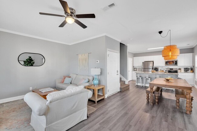 Building Photo - Updated coastal townhome- fully furnished!