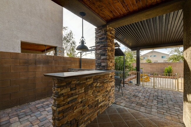 Building Photo - Pool Home with Downstairs Primary Bedroom!