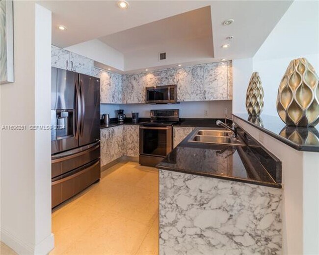 Building Photo - 16699 Collins Ave