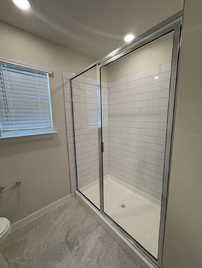 Building Photo - Live Large in Winter Garden: Modern 4-Bedroom Townhouse Haven