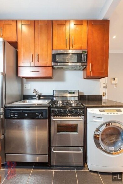 Building Photo - Renovated East Village 2-Bedroom with Sunl...