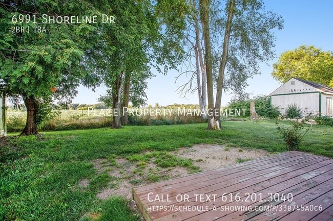 Building Photo - 6991 Shoreline Dr