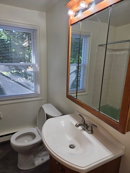 Clean & fresh bathroom with new window & mini blind. - 102 Stonecrest