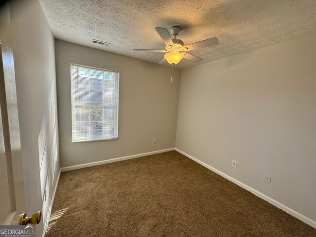 Building Photo - 5663 Windfall Ln