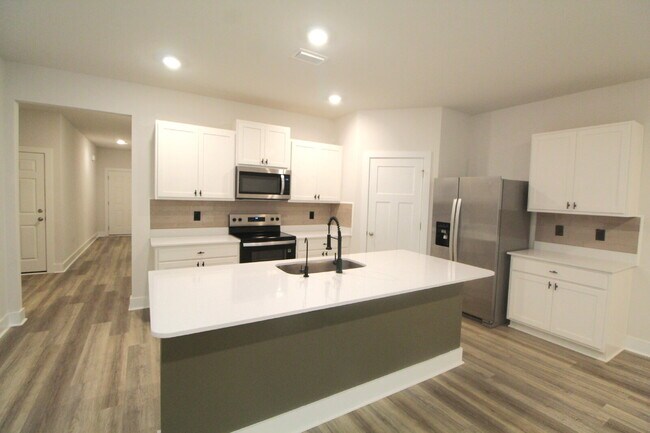 Building Photo - Modern 4BR Home in Reserve at Brookhaven with Quartz Kitchen, Smart Home Features & Open Floor Plan