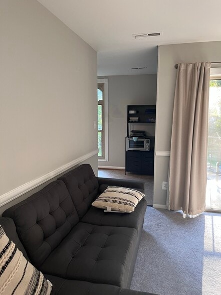 Living Room connection to Kitchen - 3304 Woodburn Village Dr