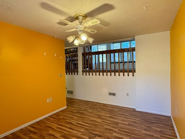 Building Photo - Open Tri-Level Townhome With Tons Of Space...