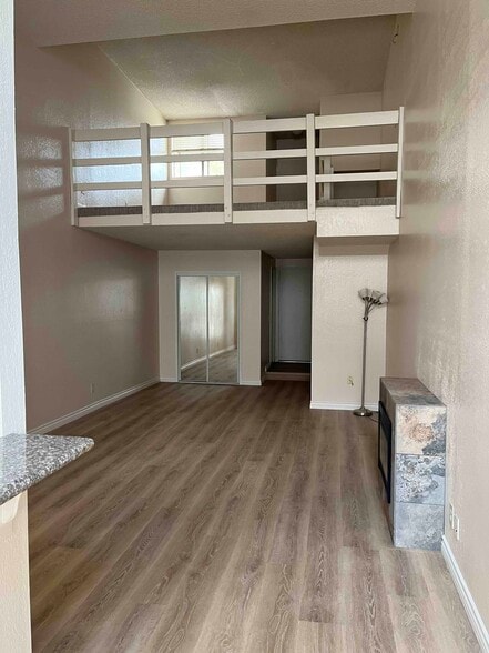 view from dining towards loft - 616 Veteran Ave