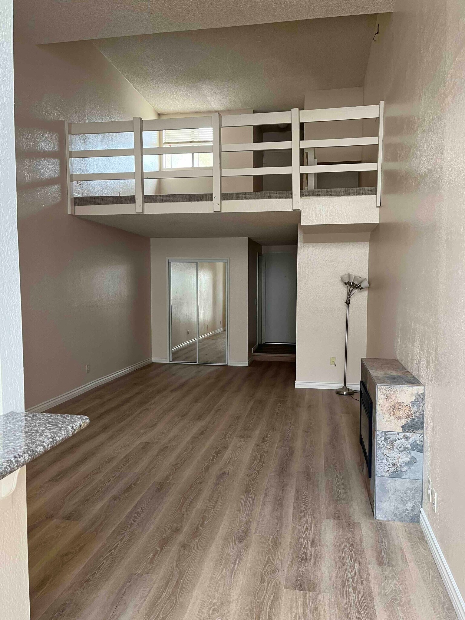 view from dining towards loft - 616 Veteran Ave