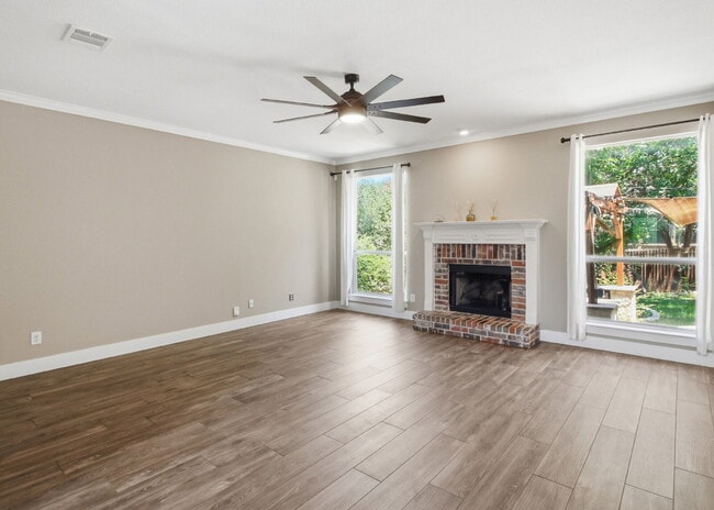 Building Photo - Updated two story. Gated subdivision. Gorgeous patio and yard!