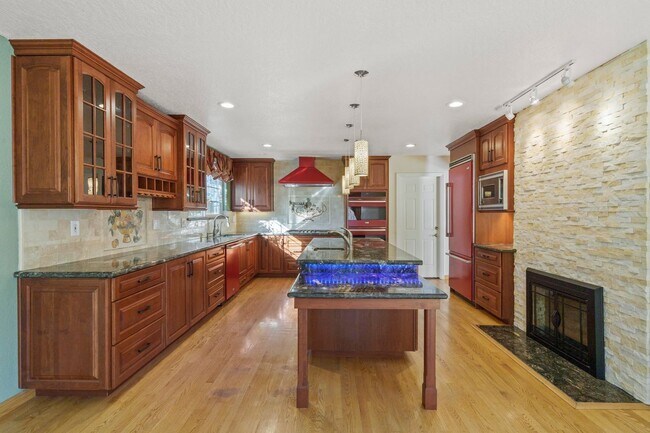 Building Photo - POOL PARADISE IN A COVETED NEIGHBORHOOD STYLISH UPGRADES | EXTREME CONVENIENCE