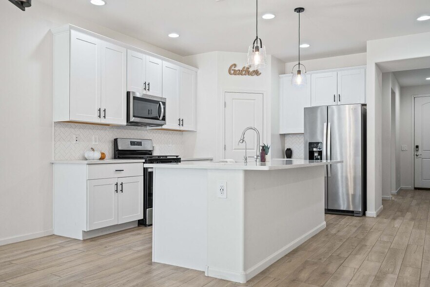 Building Photo - 12486 N Reeves Pl