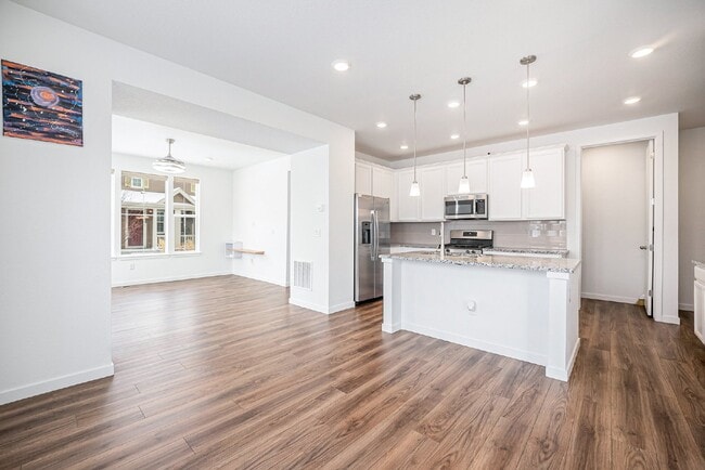 Building Photo - "Spacious 4-Bedroom Duplex Oasis with 3 Full Baths in Erie, CO - Your Perfect Home Awaits!"