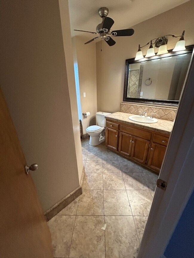 Building Photo - SW 3 Bedroom 2 Bath home with Pool. Yard Care Included.