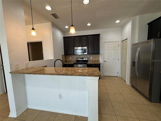 Building Photo - 11562 84th St Cir E