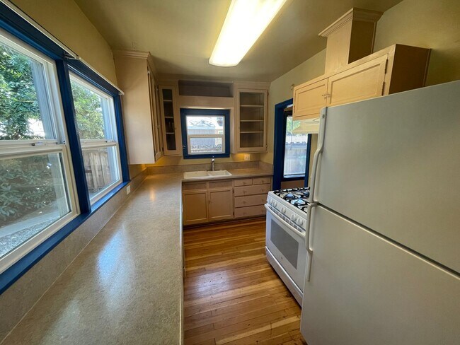 Building Photo - MASSIVE and Recently Renovated 3 Bed 2 Bath Home With Extra 1 Bed/Half Bath Bonus Cottage!