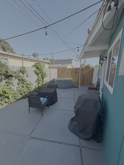 Building Photo - Fully Furnished Long Beach Retreat with Private Spa & Outdoor Entertaining Area