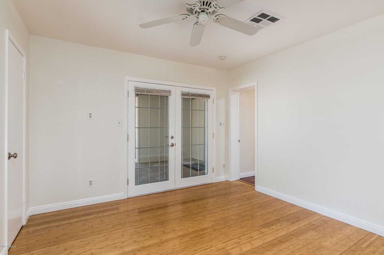 spare bedroom with patio doors - 2010 N 16th Ave