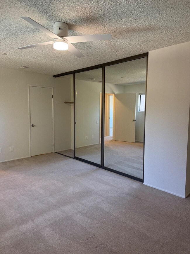 Building Photo - Spacious 3-Bedroom, 2-Bath Multi-Level Home with Balcony, In-Unit Laundry & Dual Parking