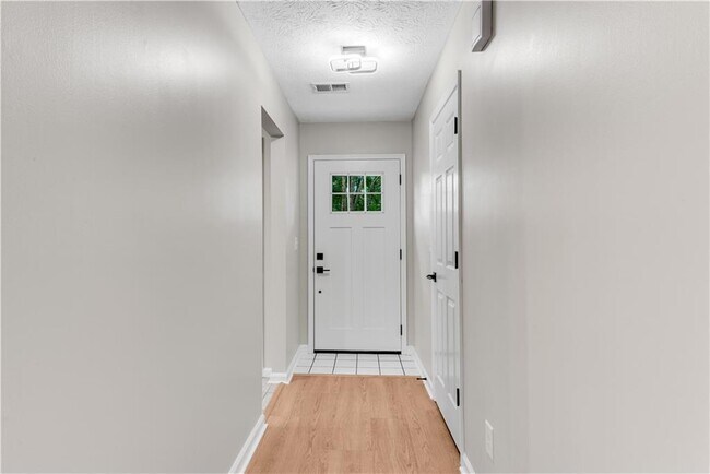Building Photo - 5097 Village Green Way