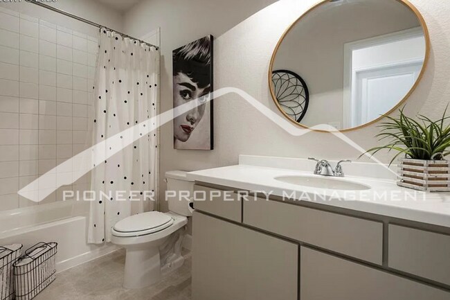 Building Photo - Stylish Main-Level Living with Finished Ba...