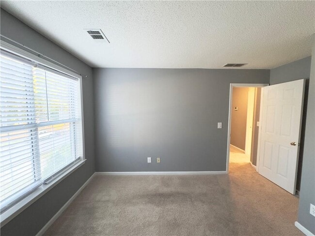 Building Photo - 11865 Carriage Park Ln