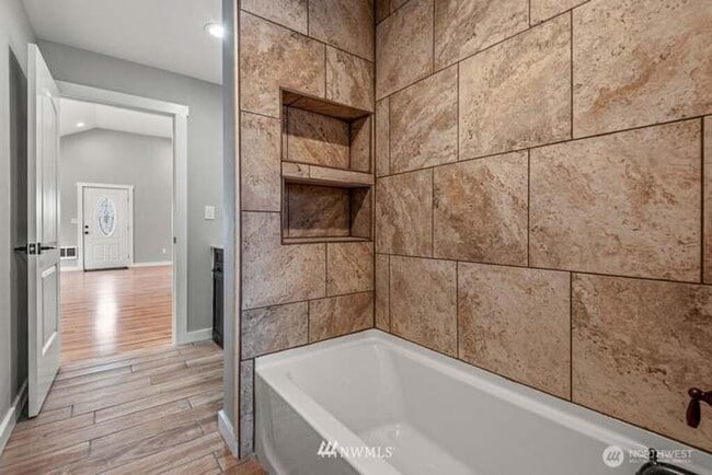 Building Photo - Remodeled open concept home with shop!