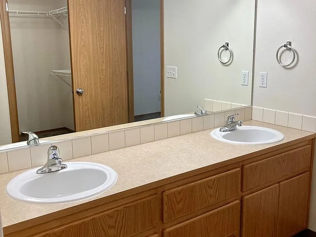Building Photo - this ranch-style home features 4 bedrooms and 2 bathrooms.