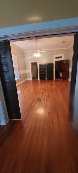 Pocket doors separating master bed room and living room/bar area - 250 S Ann St