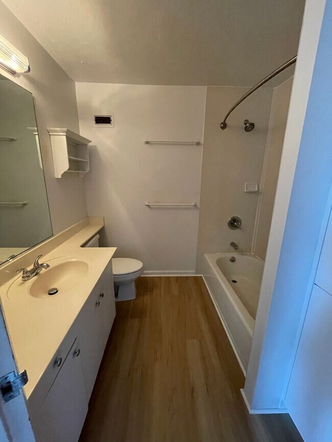 Building Photo - 11th Floor, Queen Emma Garden Unit with Upgrades and Downtown and Mountain Views.