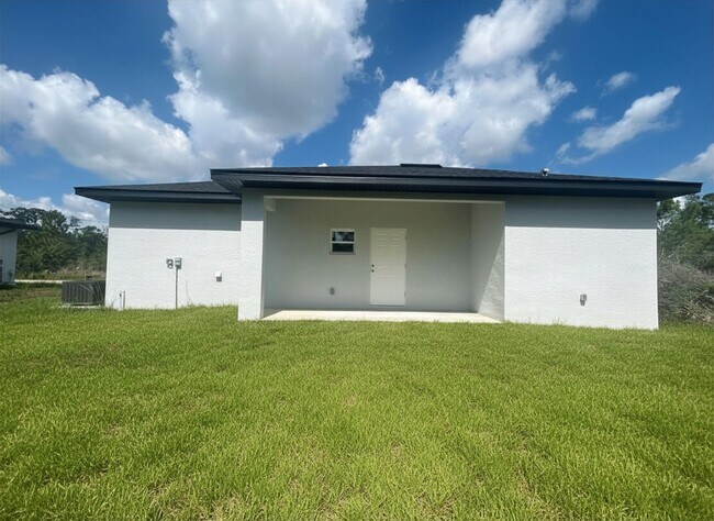 Building Photo - Brand-New Modern 2BR/2BA Home with Garage – Desirable Lake Placid Location