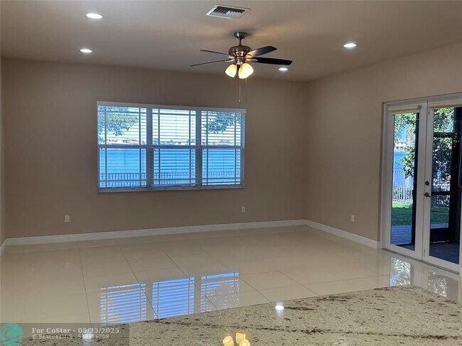 Building Photo - 9751 Blue Isle Bay