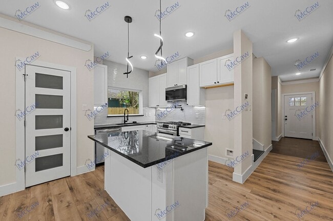 Building Photo - Updated Price for New Year!  Luxury Duplex...
