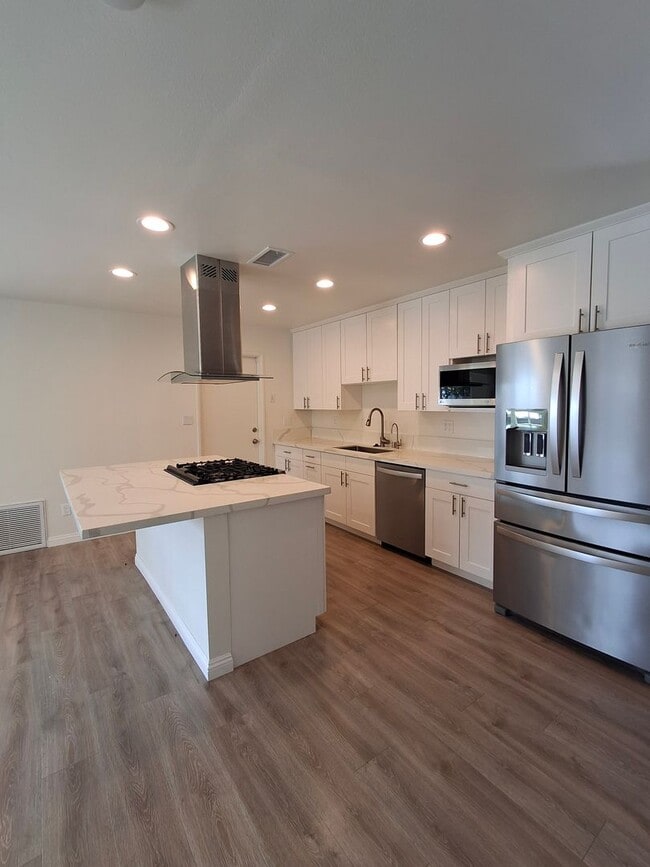 Building Photo - Beautifully Renovated Home with 2-Car Gara...
