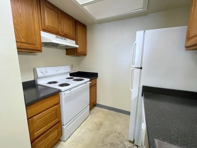 Building Photo - East Anchorage Condo with Laminate Floorin...