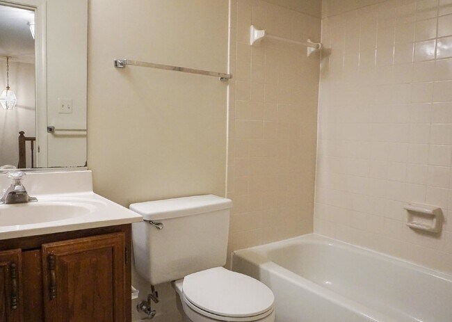 Building Photo - Beautiful brick townhome featuring three f...