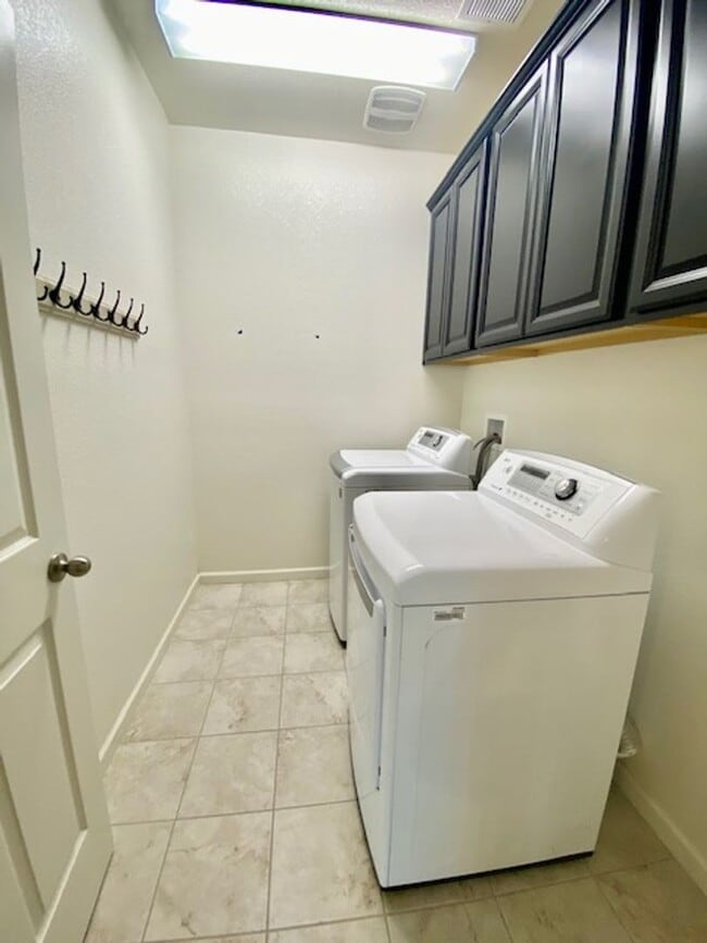 Building Photo - ALMOST NEW, UNIQUE 4 BEDROOM, 3 BATH, 2 CA...