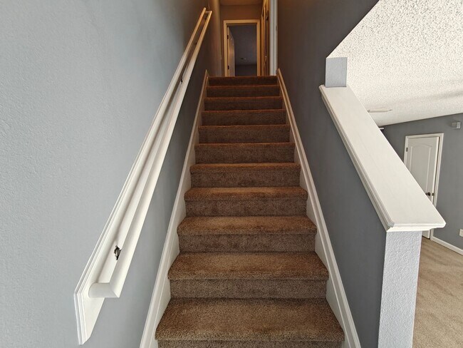 Building Photo - Spacious 2-Bed, 2.5-Bath Townhome with Gar...