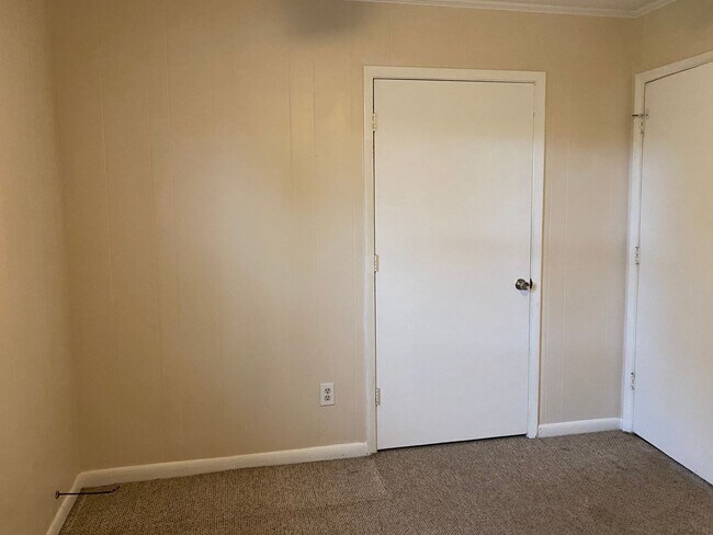 Building Photo - COMING SOON! 4Br, 2.5 baths, large kitchen, large bedrooms, fence, storage and more! N. College R...