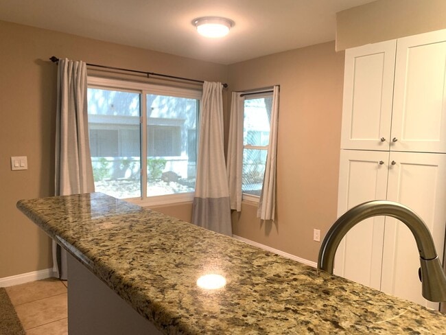 Building Photo - Thrive in this upgraded first-floor two be...