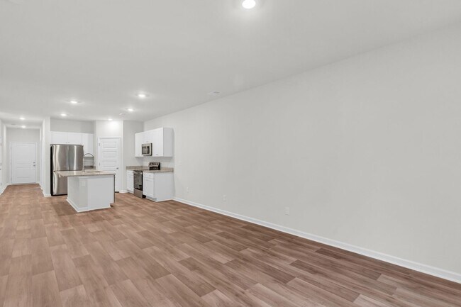 Building Photo - BRAND NEW TOWNHOME!