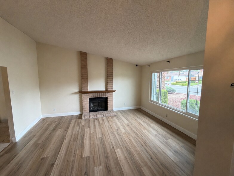 entrance opens to the living room - 220 Notre Dame Dr