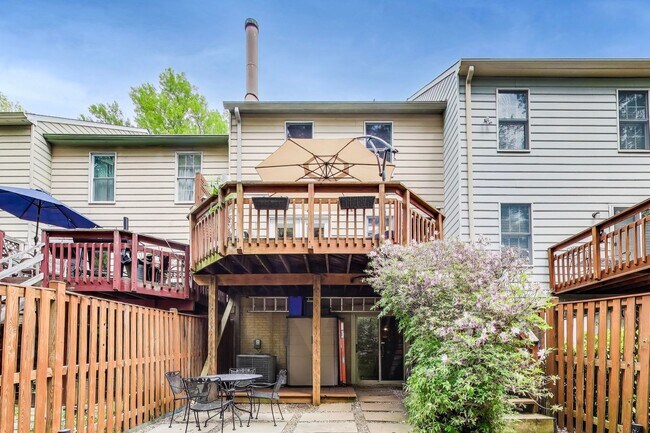 Building Photo - COMINGS SOON - Beautifully Updated Winchester-Built Townhome Backing to Serene Parkland.
