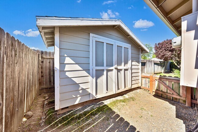 Building Photo - 3BR + Office Home in Excellent Condition with Storage Sheds and Garage Workspace!