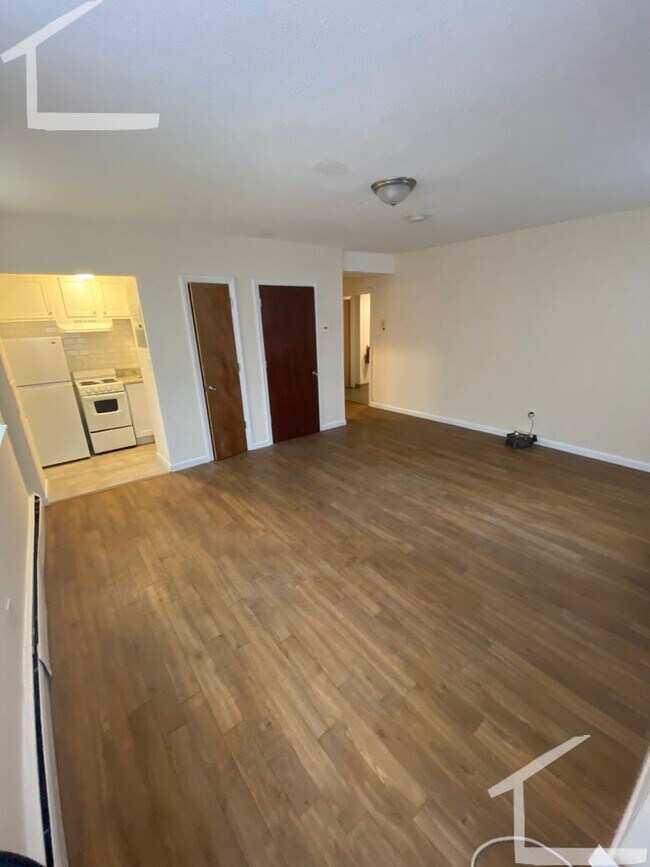 Building Photo - Huge studio with heat included for September!