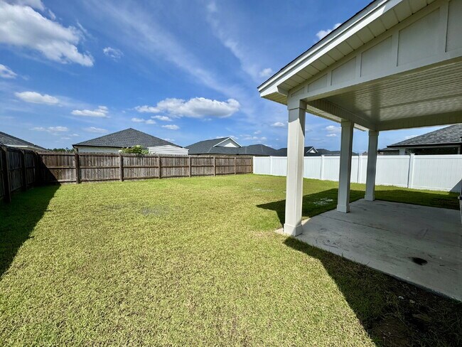 Building Photo - Need Space?  How about 5 bedrooms, 2.5 baths + an extra bonus area upstairs so that the kids can ...